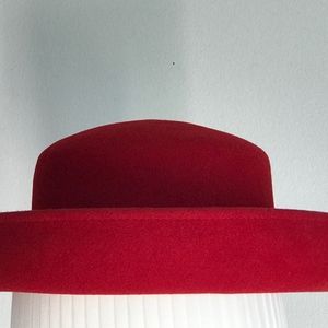 Deep red wool winter hat with brim